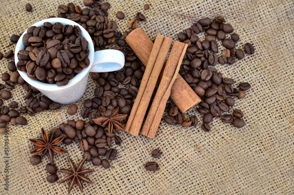 coffee beans and cinnamon sticks coffee beans and cinnamon sticks