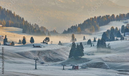 Quadro su tela Beautiful view of traditional wooden mountain chalets on scenic Alpe di Siusi wi