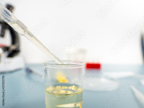 Analytical chemistry - a sample is pipetted into a test tube.