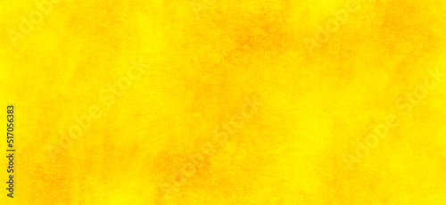 Pale painted decorative and blurry abstract orange background, Grainy and grunge soft and painted orange or yellow texture, bright and light shinny orange or yellow grunge texture.