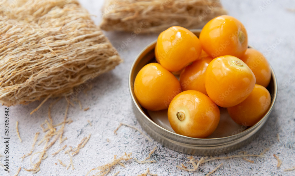 Golden berries with wheat cereal, close up