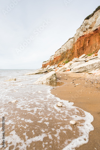 Photo Waves lap up on Hunstanton beach