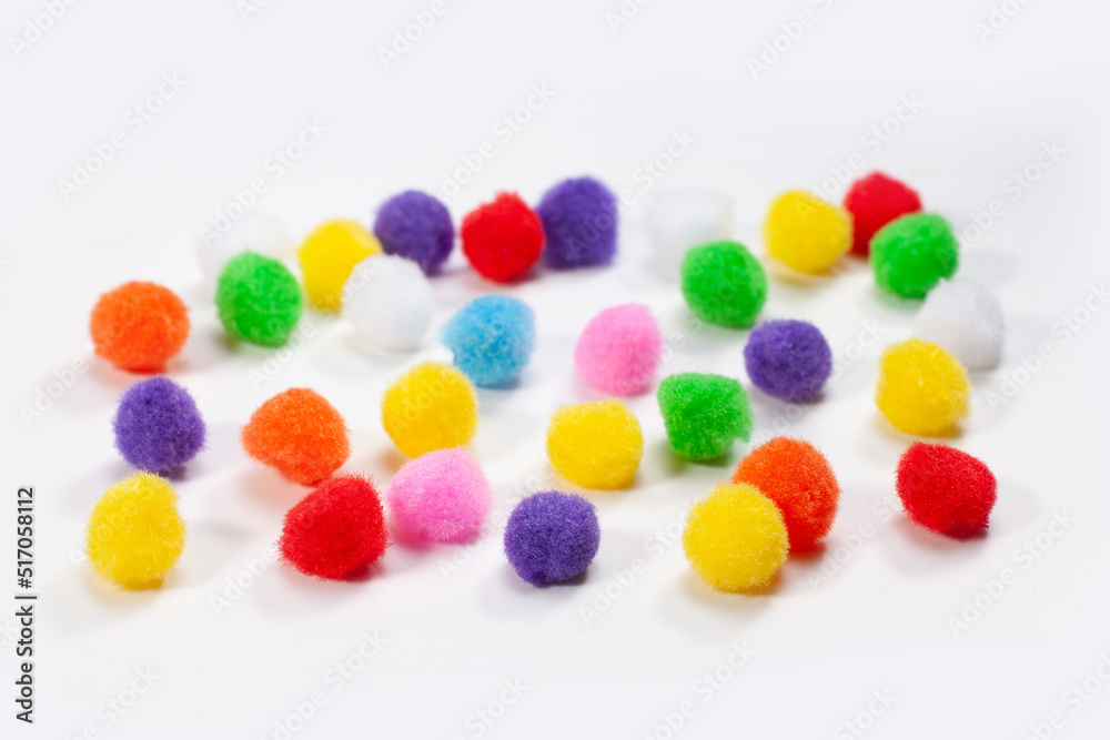 fluffy round colorful balls isolated on white background fluffy round colorful balls isolated on white background