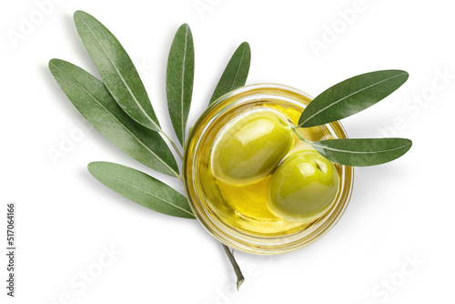 Obraz na plátně Two olives in oil with leaves, isolated on white background