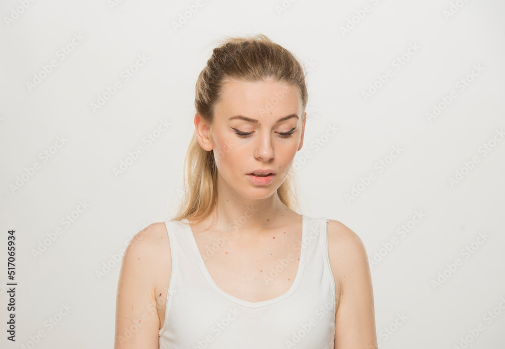 Portrait of a beautiful young women, dressed white T-shirt , isolated on white.emotional portrait of a young Ukrainian girl Portrait of a beautiful young women, dressed white T-shirt , isolated on white.emotional portrait of a young Ukrainian girl