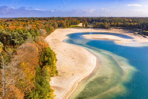 Aerial view of lakes in autumnal forest photo