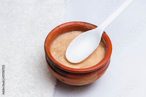 Mishti doi or Mitha Dahi is a fermented sweet dahi originating from the Bogra District in Bangladesh and is a very popular dessert throughout the country photo