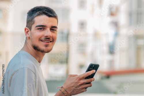 young man with mobile phone, cellular or smartphone