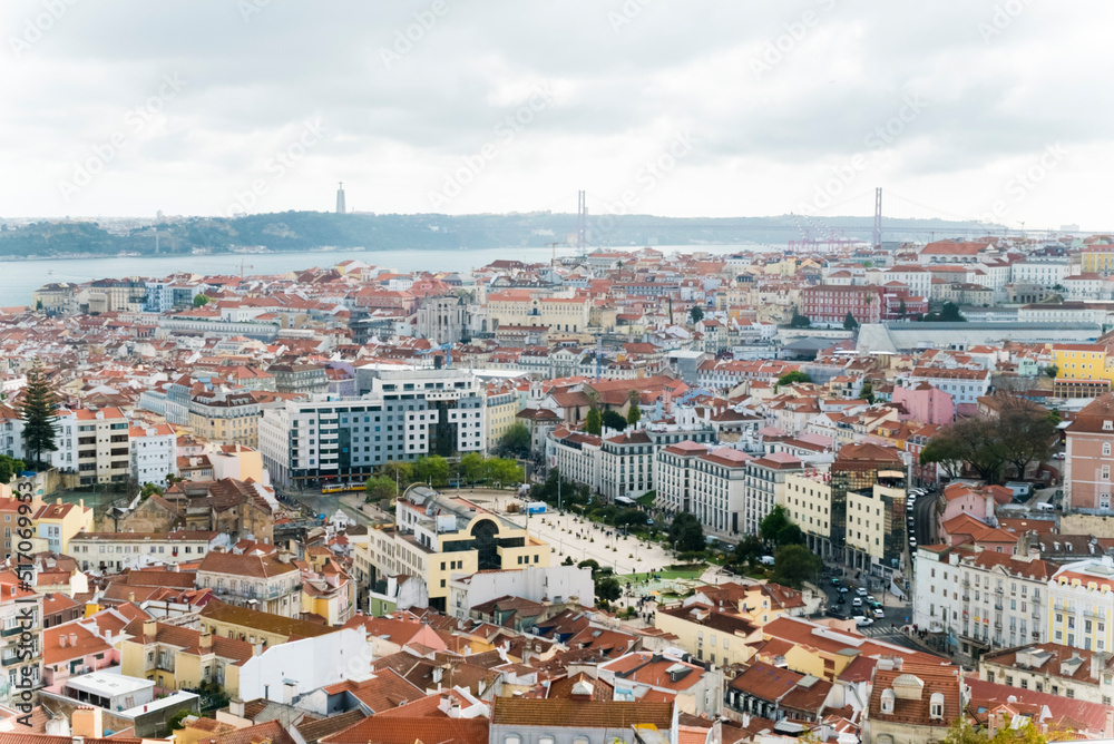 Lisboa, Portugal. April 9, 2022: Panoramic landscape and the Tagus River with a view of the 25 de Noviembre bridge.