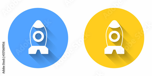 White Rocket ship toy icon isolated with long shadow background. Space travel. Circle button. Vector