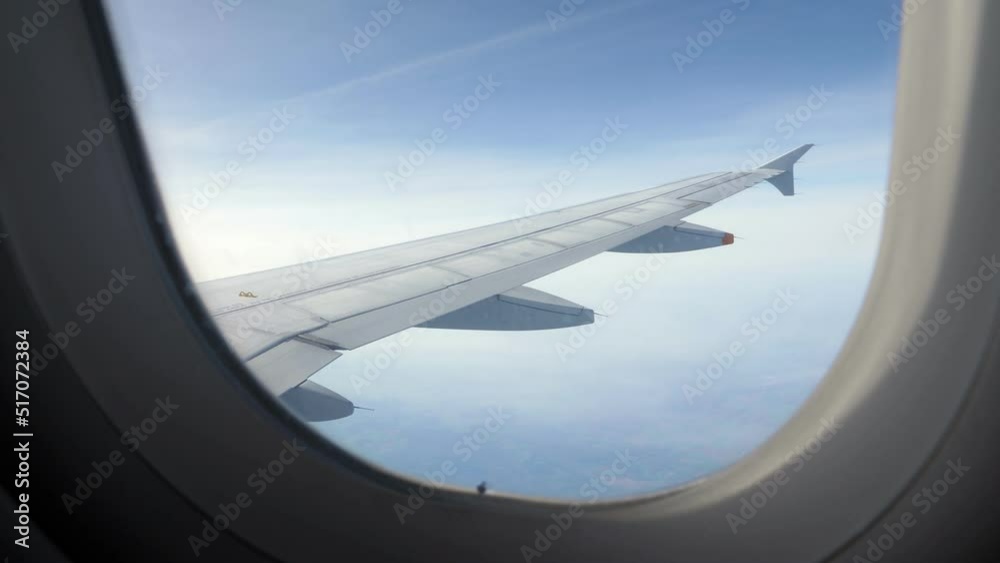 Airplane wing. Air View from plane window. Travel and transport concept. Nobody