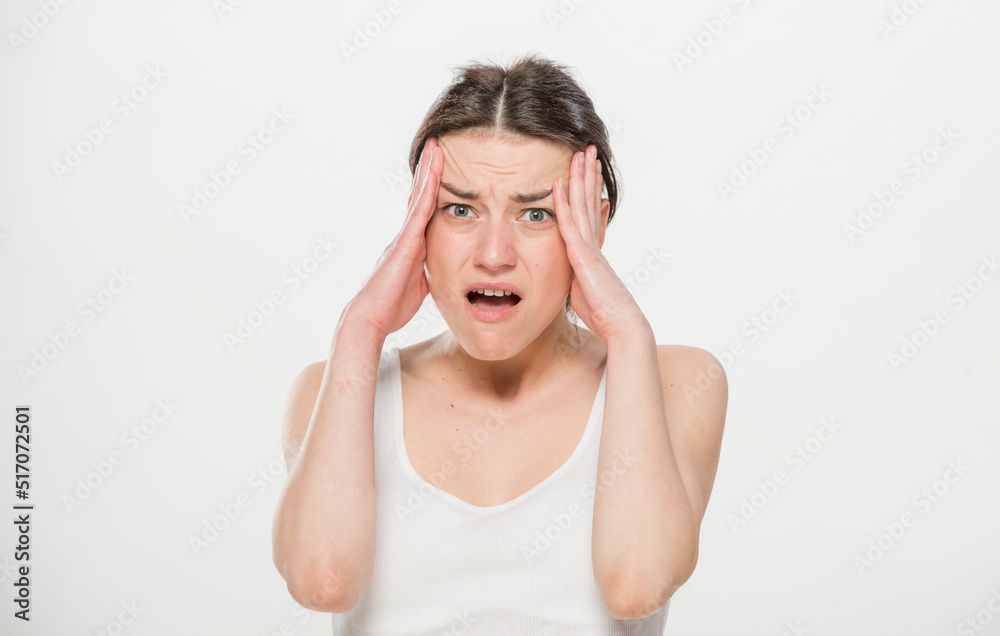 Close-up portrait of a beautiful young woman dressed in a white t-shirt isolated on white.'portrait of a young Ukrainian girl with different emotions Close-up portrait of a beautiful young woman dressed in a white t-shirt isolated on white.'portrait of a young Ukrainian girl with different emotions