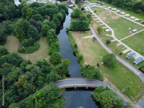 Aerial view of bridge on a river in Hoddesdon, UK with clear tranquil water