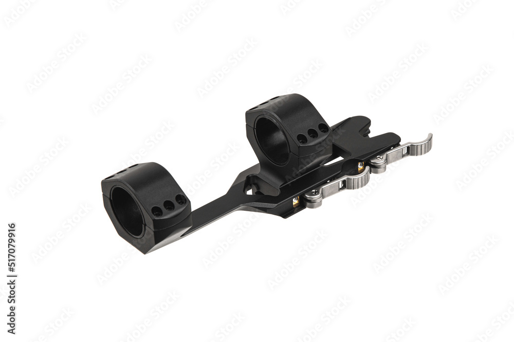 Quick disconnect mount made for holding a scope on a rifle isolated on white back. Quick Release Sniper Cantilever Scope Mount. Quick disconnect mount made for holding a scope on a rifle isolated on white back. Quick Release Sniper Cantilever Scope Mount.