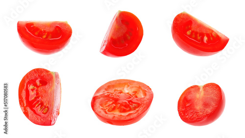 Set with pieces of tasty ripe cherry tomatoes on white background