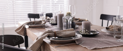 Festive table setting with beautiful tableware and decor indoors. Banner design