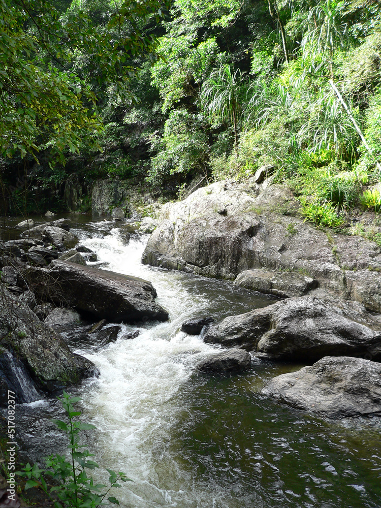 Crystal Cascades stream running through rocks in Far North Queensland in Australia Crystal Cascades stream running through rocks in Far North Queensland in Australia