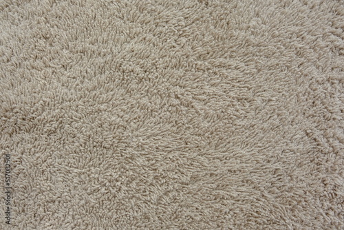 Wallpaper Mural Fluffy gentle pastel biege fabric with waves and folds. Soft pastel textile texture. Torontodigital.ca