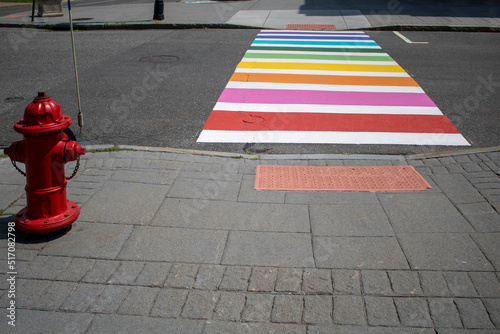 Φωτογραφία colorful street road crosswalk lines with cast iron sidewalk fire hydrant