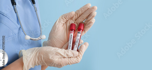 Doctor holding samples of m...