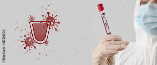 Scientist with sample of mo...