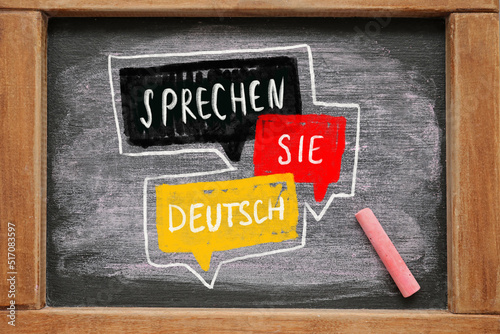 Chalkboard with text SPRECHEN SIE DEUTSCH? (DO YOU SPEAK GERMAN?)