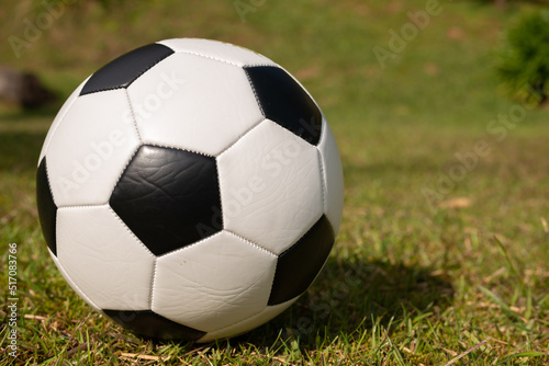 soccer ball on grass © cafera13