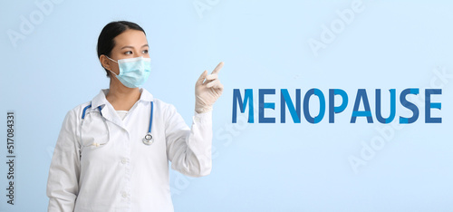 Female doctor showing word ...