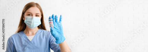 Female doctor holding monke...