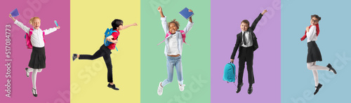 Group of jumping little sch...
