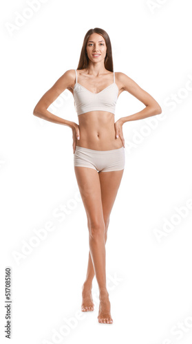Young tanned woman in underwear on white background © Pixel-Shot