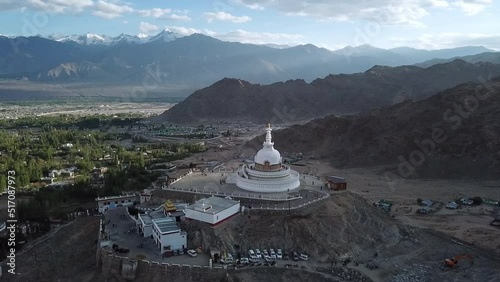 Aerial view Shanti Stupa buddhist white domed stupa overlooks the city of Leh, The stupa is one of the ancient and oldest stupas located in Leh city, Ladakh, Jammu Kashmir, India. photo