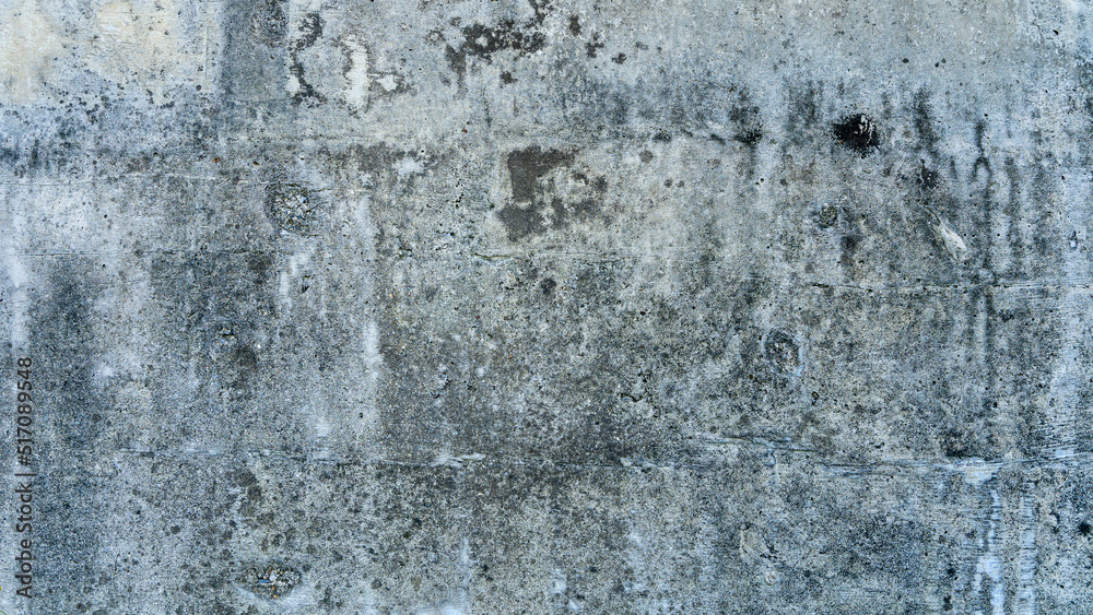 Black gray cement wall pattern texture background with slight stains.