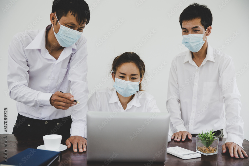 Group business people communicate working with laptop in office Group business people communicate working with laptop in office