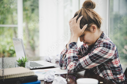 woman sitting down, his face unsettled