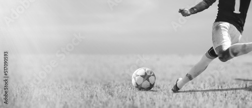 a Football Players Running and Kicking in Soccer Game.