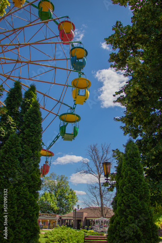 City amusement park. View of the ferris wheel. photo