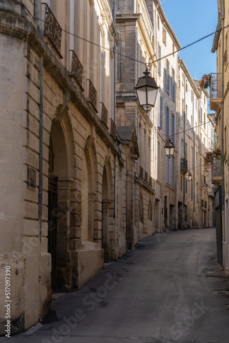 Scenic urban landscape of typical narrow street with ancient buildings in the historic center of Montpellier  France
