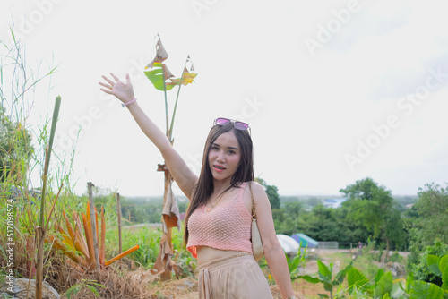 Happiness travel of young woman in nature