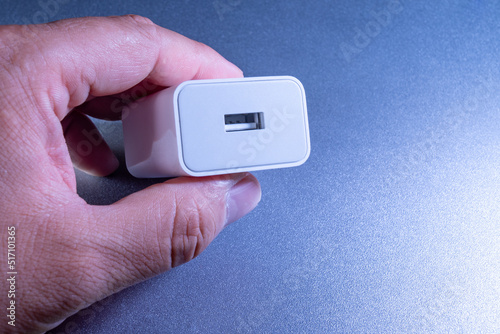 Close up of handheld USB charging power supply