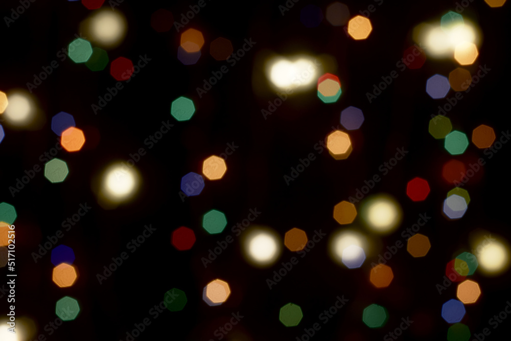 multicolored festive lights on a black background screensaver backdrop