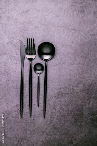 Clean black metal cutlery