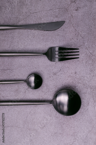 Clean black metal cutlery