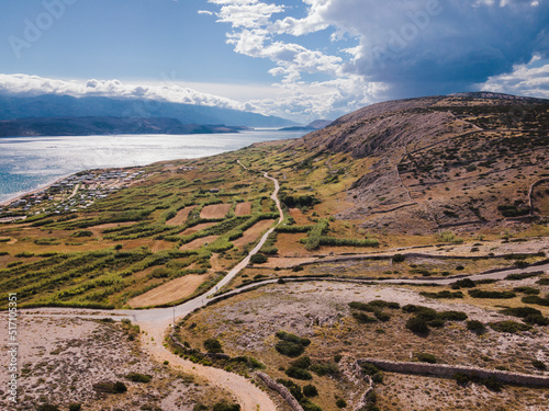 Drone flight over the beautiful island of Pag in Croatia, simuni, novalja, zrece beach photo