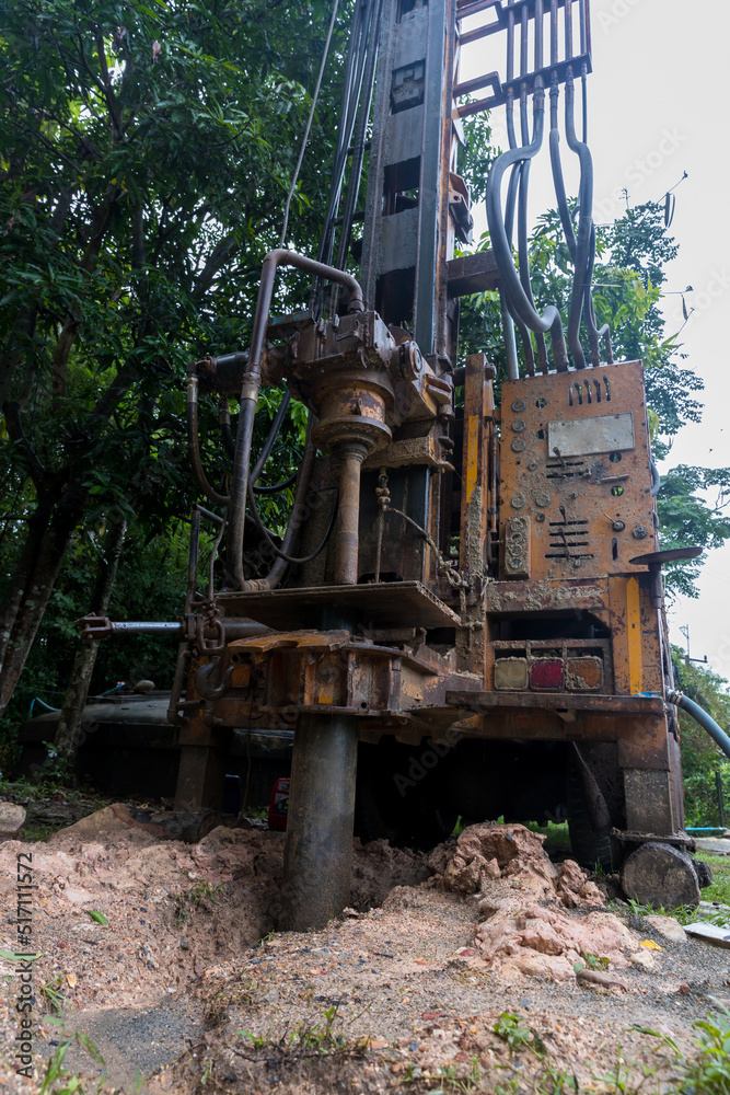 Ground water hole drilling machine installed on the old truck. Ground water drilling machine installed in rural Ground water hole drilling machine installed on the old truck. Ground water drilling machine installed in rural