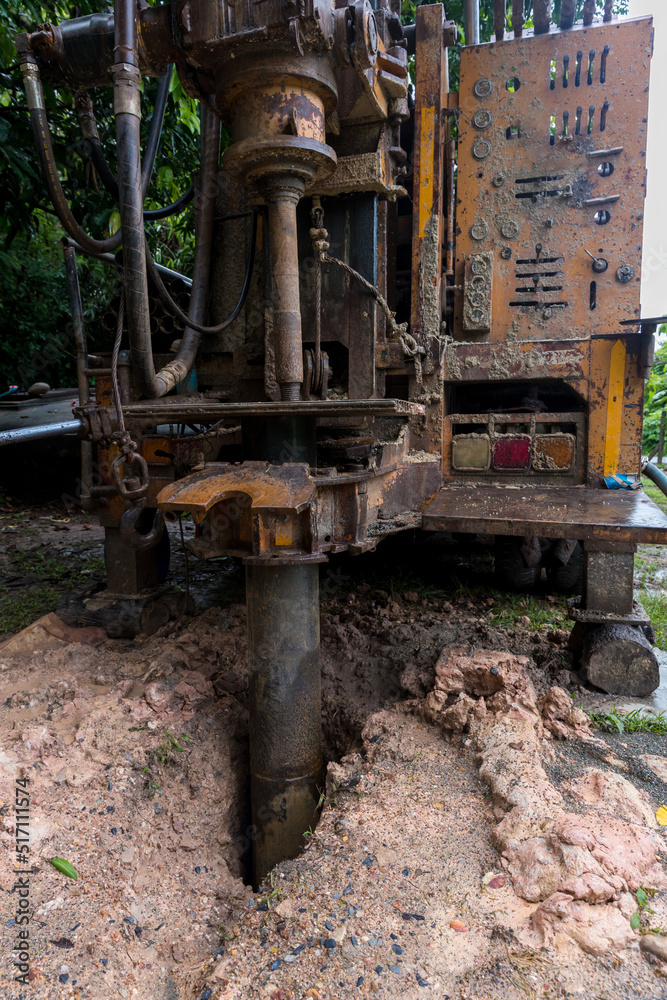 Ground water hole drilling machine installed on the old truck. Ground
