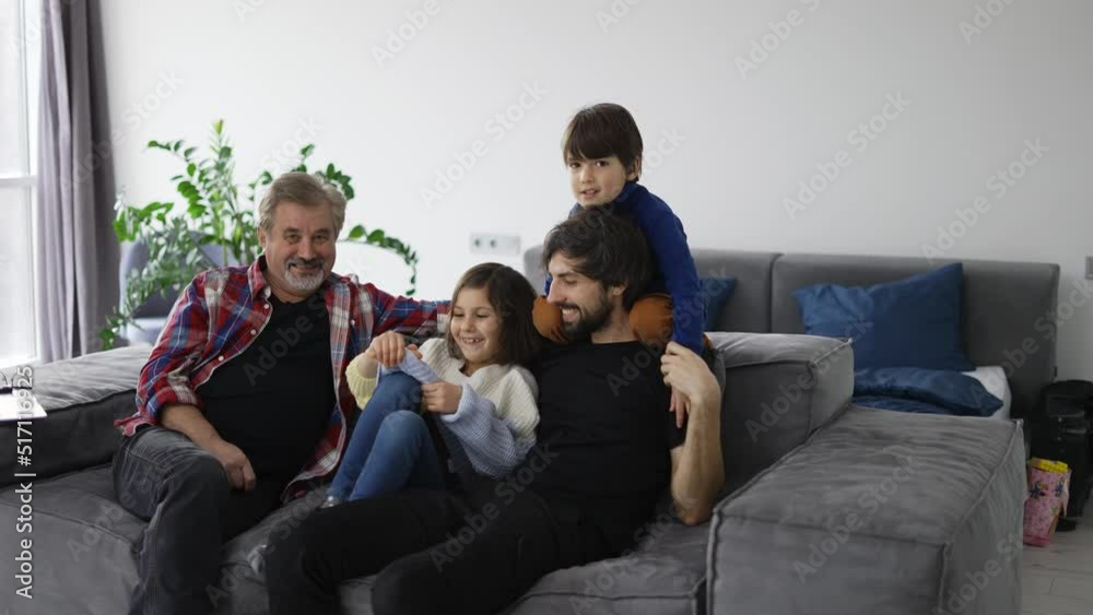 Happy family have fun and spends time together - grandpa, son and kids, slow motion Happy family have fun and spends time together - grandpa, son and kids, slow motion