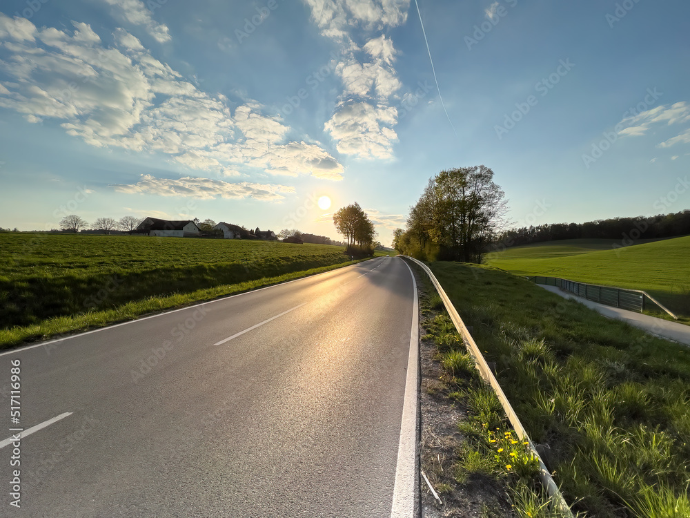 Bavarian Landscape with road to nowhere and blue sky background