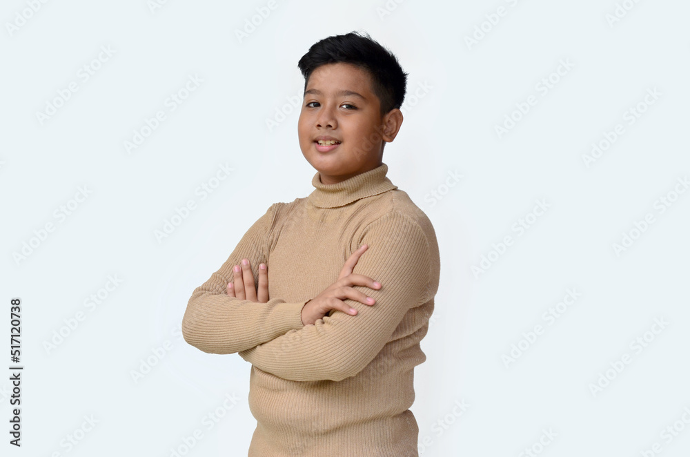 handsome asian boy with smile expression wearing sweater, isolated at white background