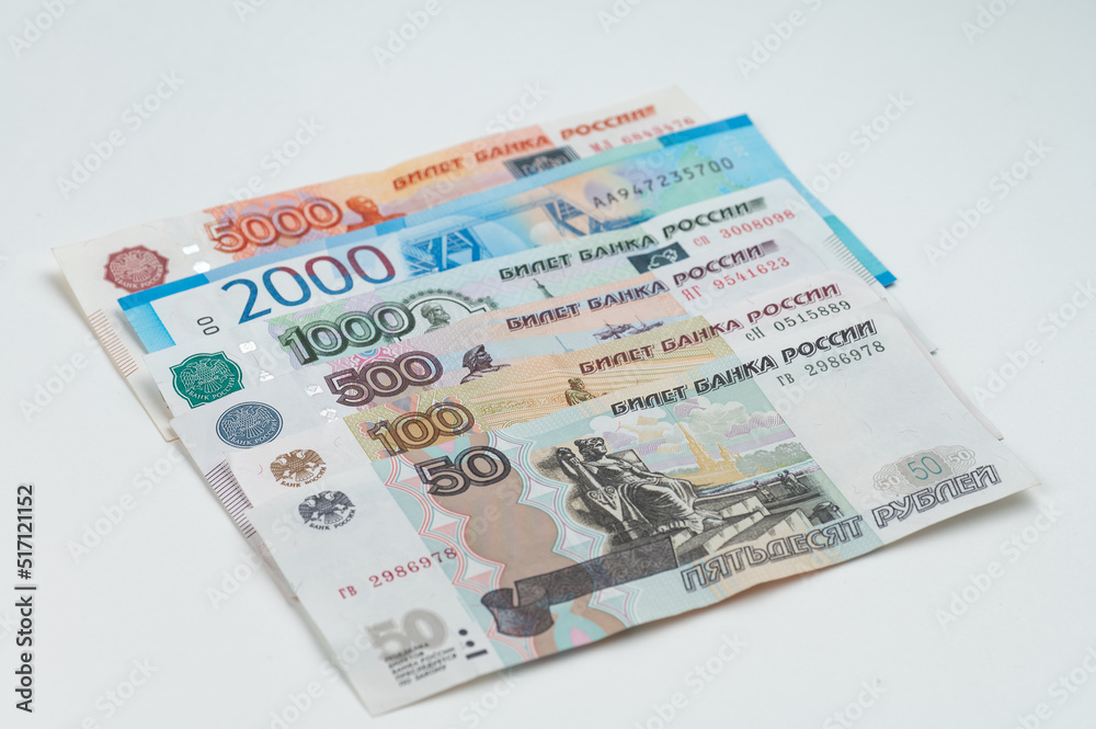 Russian rubles background. Money background and texture. Banknotes of different denominations Russian rubles background. Money background and texture. Banknotes of different denominations